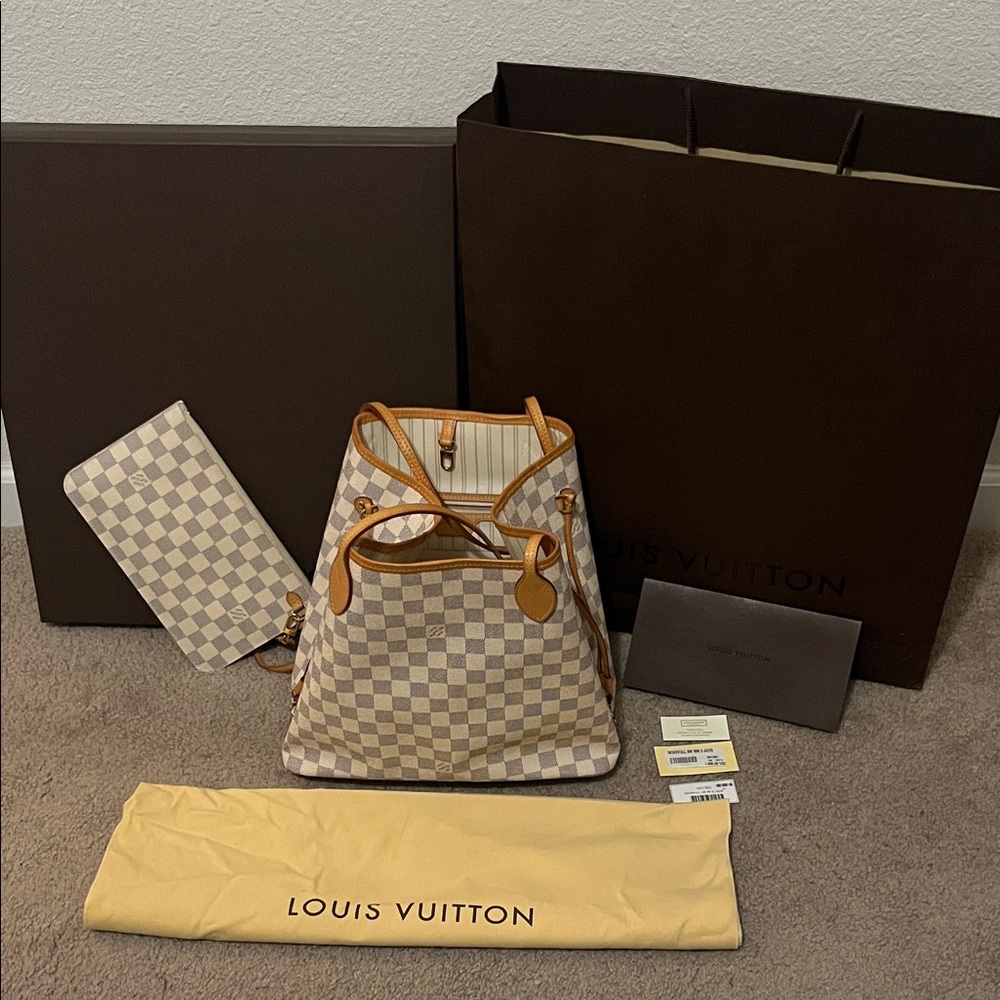 Authentic Louis Vuitton Excellent condition Neverfull Damien Azur with clutch